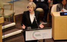 British Prime Minister Theresa May addresses delegates as she delivers a keynote speech on the refugee crisis at the United Nations General assembly on 19 September, 2016 in New York City. Picture: AFP.