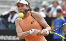 Britain's Johanna Konta returns the ball to Jelena Ostapenko of Latvia during Rome's WTA Tennis Open tournament at the Foro Italico, on 16 May 2018 in Rome. Picture: AFP.