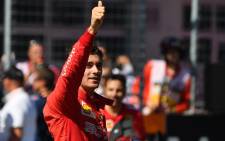 FILE: Ferrari's Monegasque driver Charles Leclerc celebrates after the qualifying session of the Austrian Formula One Grand Prix in Spielberg on 29 June 2019. Picture: AFP

