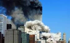 In this file photo taken on September 11, 2001, smoke billows after the first of the two towers of the World Trade Center collapses. Picture: Henny Ray Abrams / AFP
