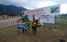 Botha Msila and his Zimbabwe travelling partner Alvin Zhakata at the Kenyan border. Picture: Botha Msila/Twitter.