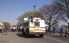 A police nyala monitors Amplats miners. Picture:Govan Whittles/EWN.