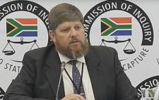 A screengrab of Eskom official Gert Opperman appearing at the Zondo Commission on 8 March 2019.