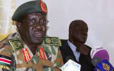 The Sudan People's Liberation Army (SPLA) Chief of Staff General James Hoth Mai speaks to the media in Juba on January 2, 2014 as South Sudan's warring parties prepare for peace talks in Ethiopia. Picture: AFP.