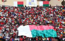 Malagasy supporters cheer during the Africa Cup of Nations 2019 qualifier Madagascar v Senegal on 9 September 2018 in Antananarivo, Madagascar. Picture: AFP