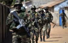 Senegalese soldiers who are part of ECOWAS (Economic Community of West African States) forces patrol in Barra, the Gambia on January 22, 2017. Picture: AFP