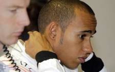 McLaren Mercedes' British driver Lewis Hamilton is pictured in the pits of the Autodromo Nazionale circuit in Monza. Picture: AFP.