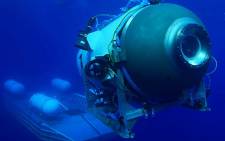 FILE: This undated image courtesy of OceanGate Expeditions, shows their Titan submersible during a descent. Rescue teams expanded their search underwater on June 20, 2023, as they raced against time to find the deep-diving tourist submersible that went missing. Picture: Handout / OceanGate Expeditions / AFP