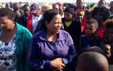 Gauteng Premier Nomvula Mokonyane addresses residents of Bekkersdal during ongoing service delivery protests on 25 October 2013. Picture: Sebabatso Mosamo/EWN.