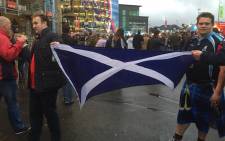 Disappointed Scottish fans proudly display their national flag after their RWC quarterfinal defeat to Australia. Picture: Vumani Mkhize/EWN.