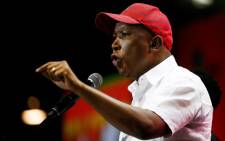 FILE: EFF leader Julius Malema delivers a closing speech on stage during the party's second National People's Assembly in Johannesburg, on 16 December 2019. Picture: AFP.