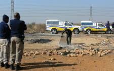 Service delivery protests at Holomisa informal settlement, Windmill Park in Boksburg, 9 July 2012. Picture: EMPD.