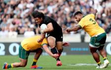 Australia's James Slipper (L) and Taniela Tupou (R) tackle New Zealand's Caleb Clarke during the second Bledisloe Cup rugby union match between New Zealand and Australia in Auckland on 18 October 2020. Picture: AFP
