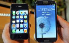 Apple Inc vs Samsung Electronics. Picture: AFP.