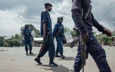 FILE: Congolese National Police respond to protests in the Majengo neighborhood of Goma, on 22 March 2019, following four deaths and 10 kidnappings the previous night by unknown assailants. Picture: AFP.