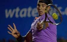 Rafael Nadal of Spain returns the ball to his compatriot David Ferrer during their final Mexico ATP Open men's single tennis match in Acapulco on 2 March 2013. Picture: AFP