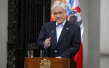 FILE: Chilean President Sebastian Pinera addresses the nation in Santiago, on 26 October 2019. Picture: AFP
