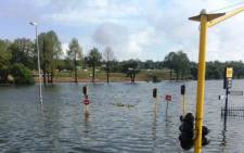 The corner of Mowbray Street and Tom Jones Street in Benoni was flooded following severe thunderstorms in Gauteng on 28 November 2013. Picture: Melissa Oates/iWitness.