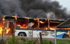 FILE: Bus set alight near depot in George during protests. Picture: Werner Vermaak ER24