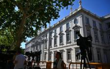 FILE: Journalists set cameras in front of Spain's Supreme Court in Madrid on 21 June 2019, on the day the court will examine a case so controversial it sparked mass protests after five men accused of gang-raping a woman were convicted of the lesser crime of sexual abuse. Picture: AFP