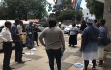 Members of the Social Justice Coalition stage a picket outside the police headquarters in Cape Town on 23 January 2017. Picture: Shamiela Fisher/EWN.