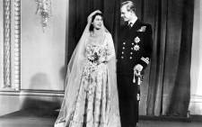 This file photo taken on 20 November, 1947 shows Britain's Princess Elizabeth (future Queen Elizabeth II) and Philip Duke of Edinburgh pose on their wedding day, 20 November 1947 in Buckingham Palace. Picture: AFP.