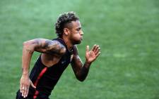 FILE: Barcelona's Brazilian forward Neymar runs during a training session at the Red Bull Arena in Harrison, New Jersey, on 21 July 2017. Picture: AFP.