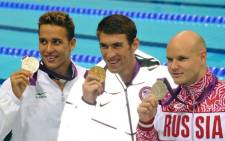 Chad le Clos (L), Michael Phelps (C)and Evgeny Korotyshkin (R) hold their Olympic medals.  Picture: Wessel Oosthuizen/SA Sports Picture Agency.