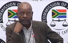 A YouTube screengrab of Ronald Shingange, the former advisor to the late former Minister in the Presidency Collins Chabane, appearing at the state capture inquiry on 14 January 2020.