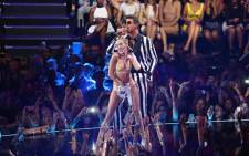 Miley Cyrus and Robin Thicke perform onstage during the 2013 MTV Video Music Awards on 25 August 2013 in New York City. Picture: AFP