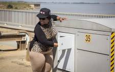 FILE: Water & Sanitation Minister Nomvula Mokonyane presses a button to open two sluice gates at the Vaal damn on 26 February 2017. Picture: Reinart Toerien/EWN