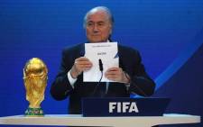 FILE: FIFA President Sepp Blatter unveils Qatar as the host nation of the 2022 FIFA World Cup. Picture: Facebook.com