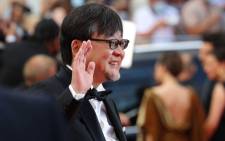 Japanese animation director Mamoru Hosoda arrives for the screening of the film "France" at the 74th edition of the Cannes Film Festival in Cannes, southern France, on 15 July 2021. Picture: Valery Hache/AFP