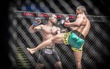 Bruno Mukulu launches a reverse right at his opponent Joe Cummins during their bout at EFC 45. Picture: Thomas Holder/EWN