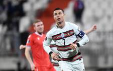 Portugal's forward Cristiano Ronaldo celebrates after scoring a goal during the Fifa World Cup Qatar 2022 qualification Group A football match between Luxembourg and Portugal at the Josy Barthel Stadium, in Luxembourg City, on 30 March 2021. Picture: John Thys/AFP