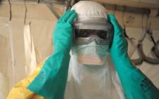 Health specialists prepare for work in an isolation ward for patients with Ebola at the Doctors Without Borders facility in Guékedou, southern Guinea. Picture: AFP.