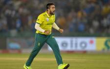 FILE: South Africa's Tabraiz Shamsi celebrates after he dismissed India's Shikhar Dhawan during the second Twenty20 international cricket match of a three-match series between India and South Africa at Punjab Cricket Association Stadium in Mohali on 18 September 2019. Picture: AFP