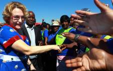 Democratic Alliance ( DA ) leader Helen Zillle is greeted by supporters at Phoenix township,south of Durban during Freedom Day Celebrations on Saturday, 27 April 2013. Picture: Sapa