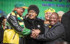 Winnie Madikizela-Mandela clasps the hands of President Jacob Zuma and Deputy President Cyril Ramaphosa at the ANC national policy conference at Nasrec on 30 June 2017. Picture: Thomas Holder/EWN