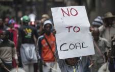 "FILE: People from different climate justice movements gather in Johannesburg in November 2015 to protest against rising global temperatures and the threat to the livelihood of the poor. Picture: AFP.
