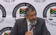 A YouTube screengrab shows Transnet acting group chief executive Mohammed Mahomedy give testimony at the state capture inquiry on 15 May 2019.