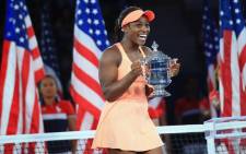 Sloane Stephens of the US poses with the championship trophy after defeating Madison Keys of the US in the Women's Singles final match on Day Thirteen during the 2017 US Open on 9 September, 2017 in the Queens borough of New York City. Picture: AFP.