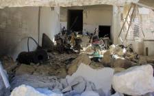 FILE: A picture taken on 4 April 2017 shows destruction at a hospital in Khan Sheikhun, a rebel-held town in the northwestern Syrian Idlib province, following a suspected toxic gas attack. Picture: AFP