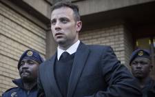 FILE: Convicted murderer Oscar Pistorius leaves the High Court in Pretoria after the conclusion of sentencing arguments in his murder trial. Picture: Reinart Toerien/EWN.
