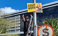 Good Party leader Patricia de Lille puts up her party's elections posters in the Cape Town CBD on 16 September 2021. Picture: @ForGoodZA/Twitter