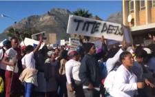 A screengrab of a group of residents from different areas across Cape Town is protesting against a social housing company. Picture: Monique Mortlock/EWN.