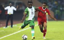 Nigeria's Moses Simon fights for the ball with Sudan's Mustafa Elfadni during their 2021 Africa Cup of Nations group D clash at the Roumdé Adjia Stadium in Garoua, Cameroon. Picture: Daniel Beloumou Olomo/AFP