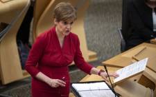 Scotland's First Minister Nicola Sturgeon reacts as she attends the First Minister's Questions session at the Scottish Parliament in Holyrood, Edinburgh on 26 November 2020. Picture: AFP
