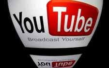 FILE: According to HRW, four bloggers and a driver working with YouTube channels reporting on the impact of COVID-19 guidelines on the vulnerable were arrested in April 2020. Picture: Lionel Bonaventure/AFP.