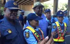Acting national police commissioner Khomotso Phahlane (left) and Police Minister Nkosinathi Nhleko (centre) visit Durban on 31 December 2016. Picture: SAPS.
